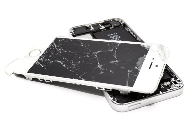 Picture of a broken phone for the article about what is e-waste.